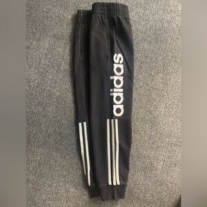 Adidas Black Sweatpants with Iconic Stripes